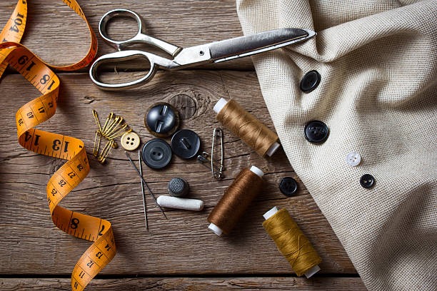 Bobinas, hilos y repuestos para máquinas de coser industriales y de confección textil